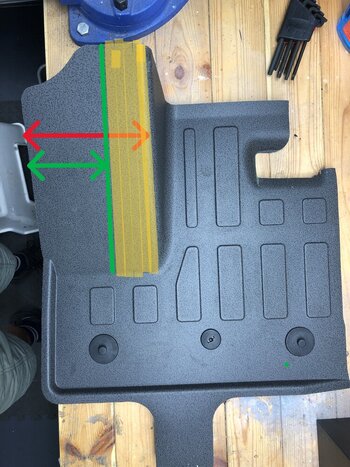 drivers floor and footrest showing metal and foam divide.JPG