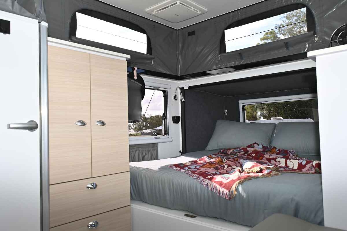 Stealth-12-Beach-Interior-bed-and-storage.jpg